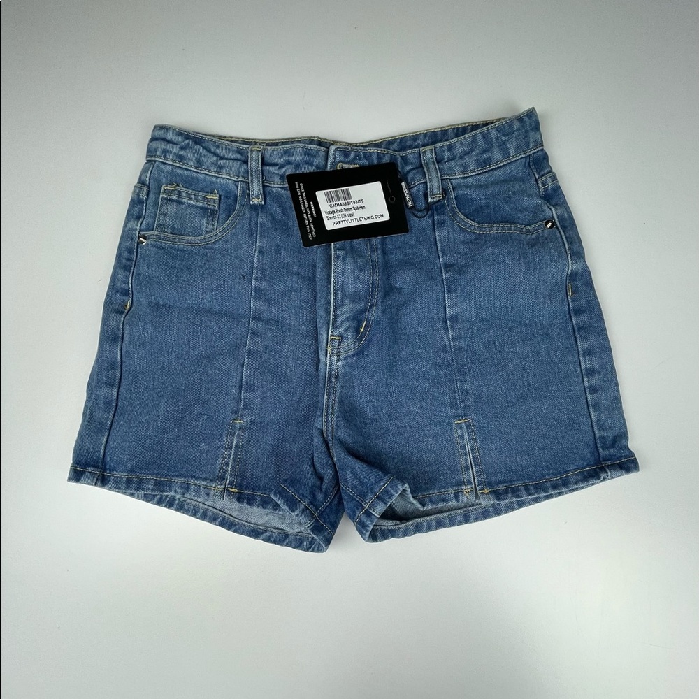 Vintage wash denim split hem shorts